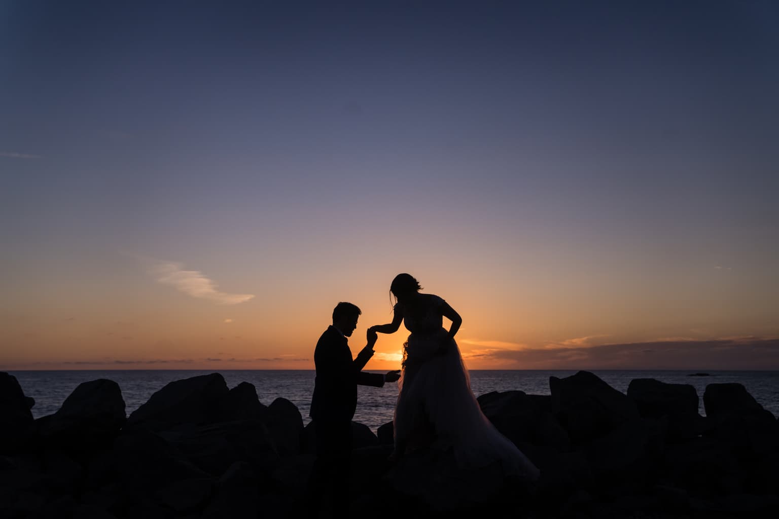 Joyful couple at intimate coastal California wedding