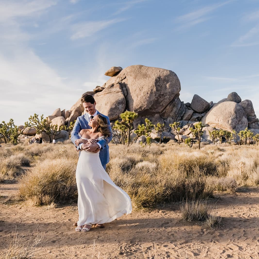 Couple dancing in the desert at their Palm Springs micro wedding