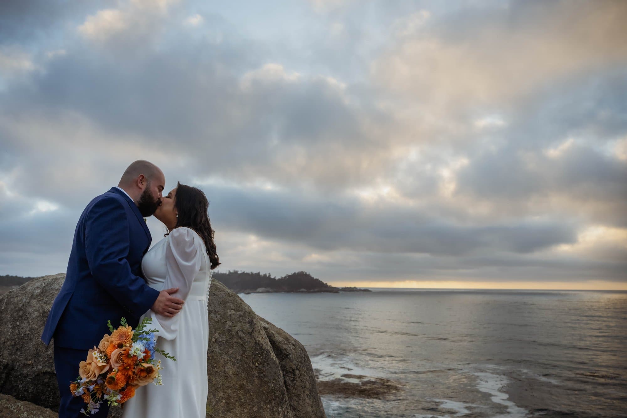 A couple celebrating at a Big Sur micro wedding