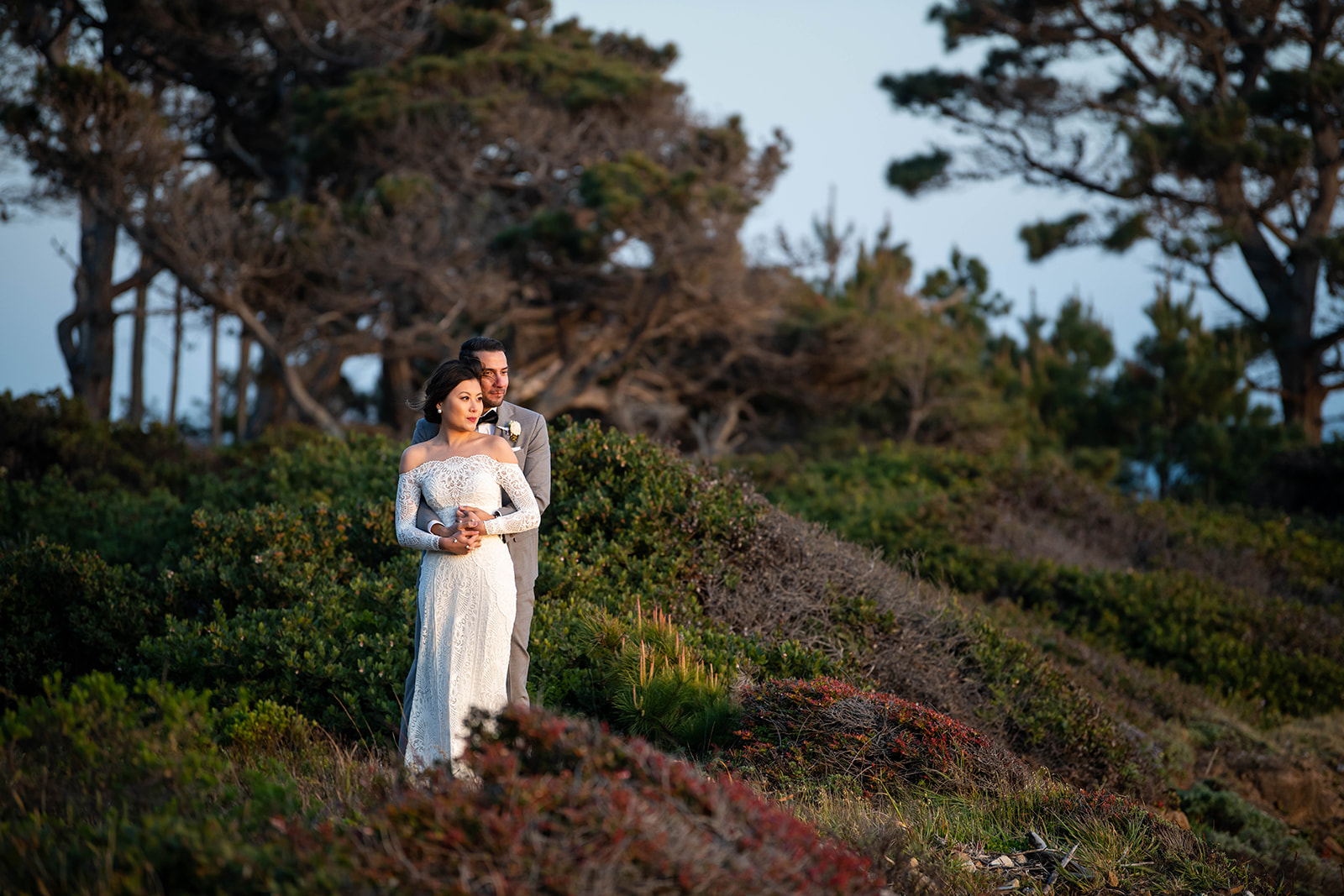 Couple on coastal bluff at Mendocino elopement